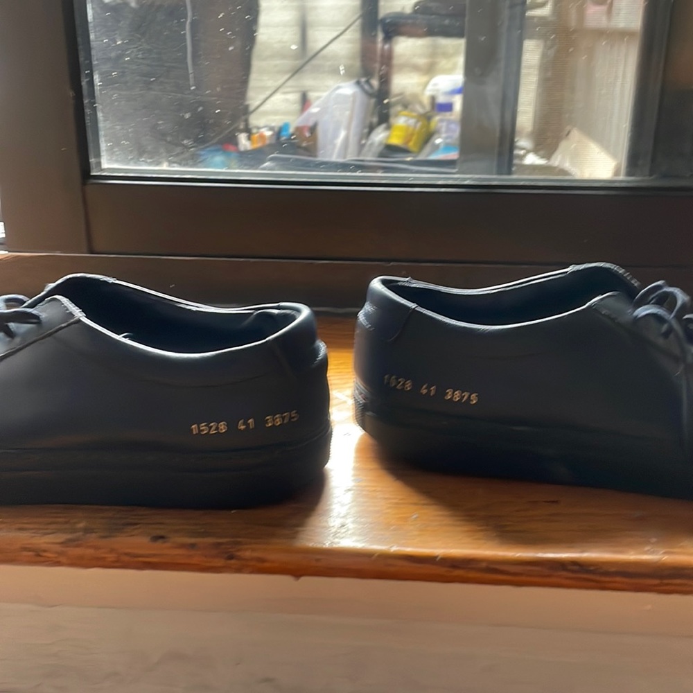 Common Projects size 41 navy blue leather. Good condition. Only wore a few times